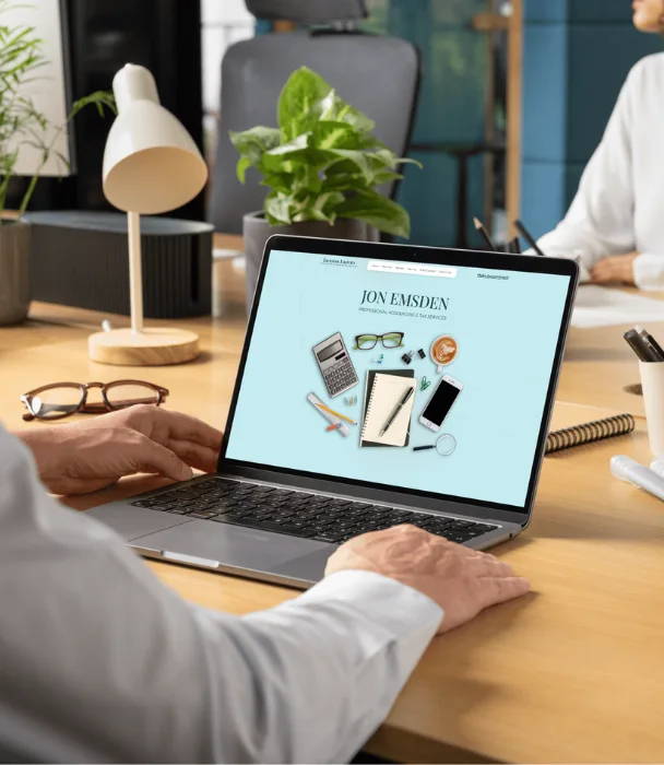 Someone working on a laptop